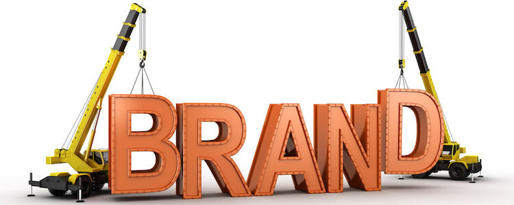 3d rendering of a mobile crane lifting the last letters in place to spell the word BRAND, to illustrate the concept of building a brand.